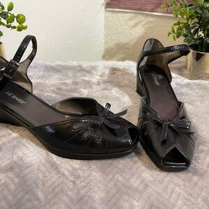 Liz Baker Black Heels with Peep-Toe Design and Ankle Strap